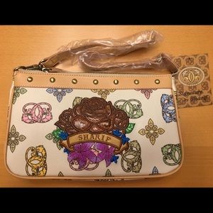 Rare find. Signature by Sharif purse